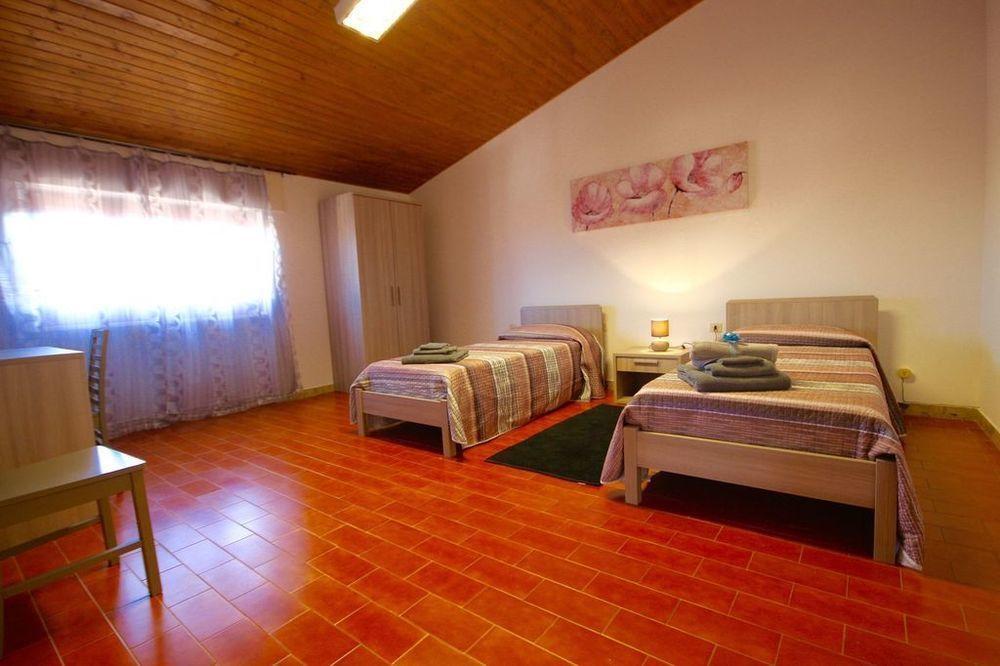 Отель Casa Lucia Ольбия Экстерьер фото